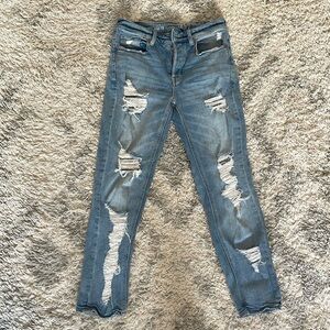 American Eagle Outfitters very Distressed TOMGIRL Jeans